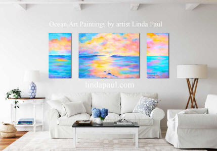 beach house coastal living room with ocean art